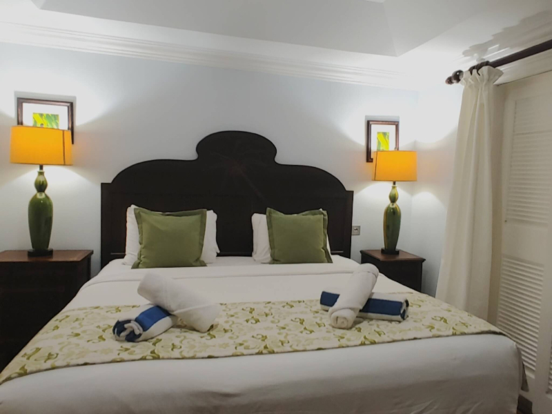 St. Lucia Real Estate Cap Cove – 3 Bedroom Townhouse + 1 Bed Cottage well decorated cozy bedroom