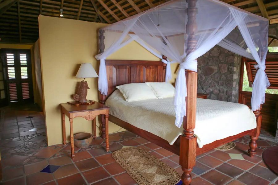 St. Lucia Real Estate Villa Piton views four poster bed